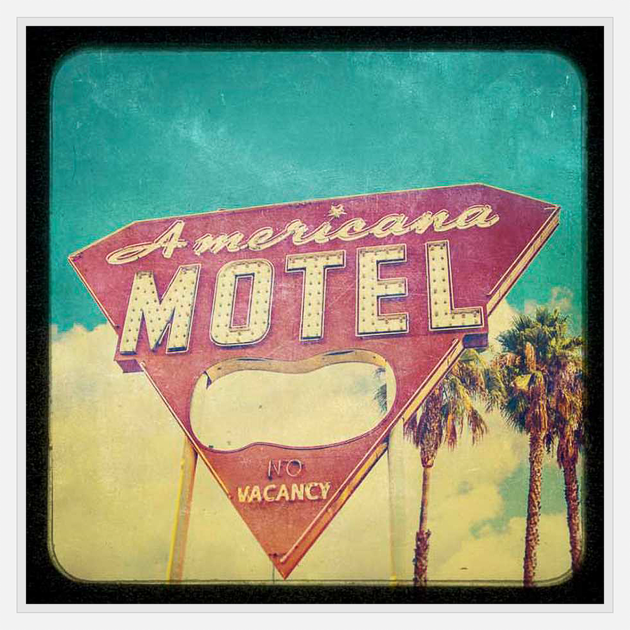 This vintage-inspired print features a classic Americana motel sign under a vibrant sky. It's perfect for adding a touch of retro charm to any space, invoking memories of road trips and carefree days.