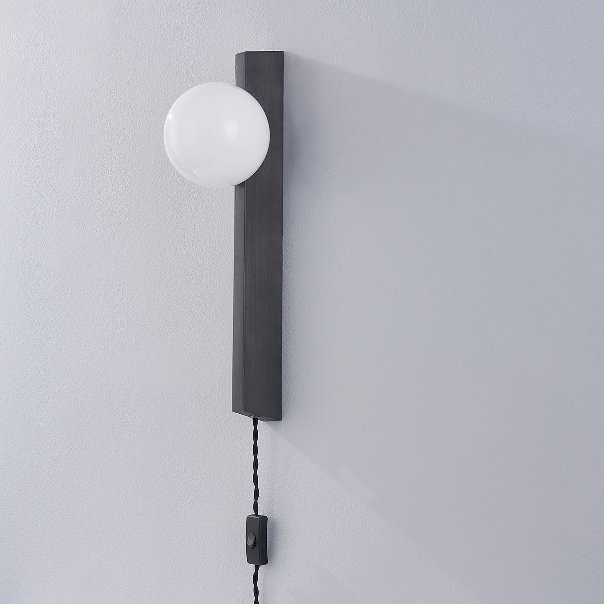 brisbane-plug-in-sconce-PTL4219-GRA-1
