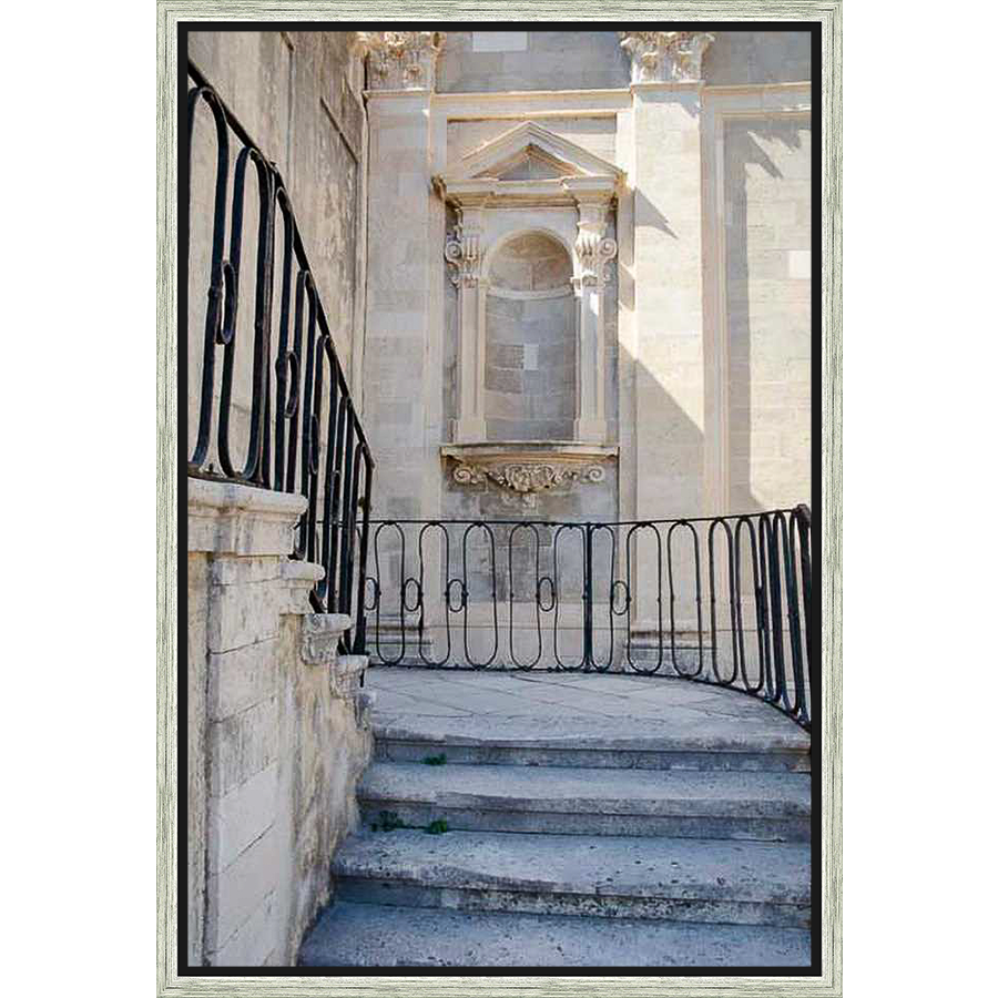 Capture the timeless beauty of architecture with this stunning print. This artwork features a classical stone facade, steps leading up to a decorative balcony, and a wrought iron railing. It evokes the charm of European cityscapes and the elegance of historical design.