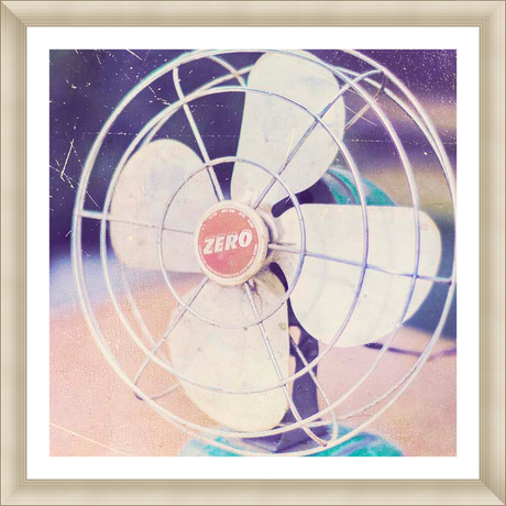 This vintage-inspired artwork features a close-up of an old fan, showcasing its intricate metalwork and retro design. The image is enhanced with a faded, textured effect, evoking a sense of nostalgia and timeless charm.